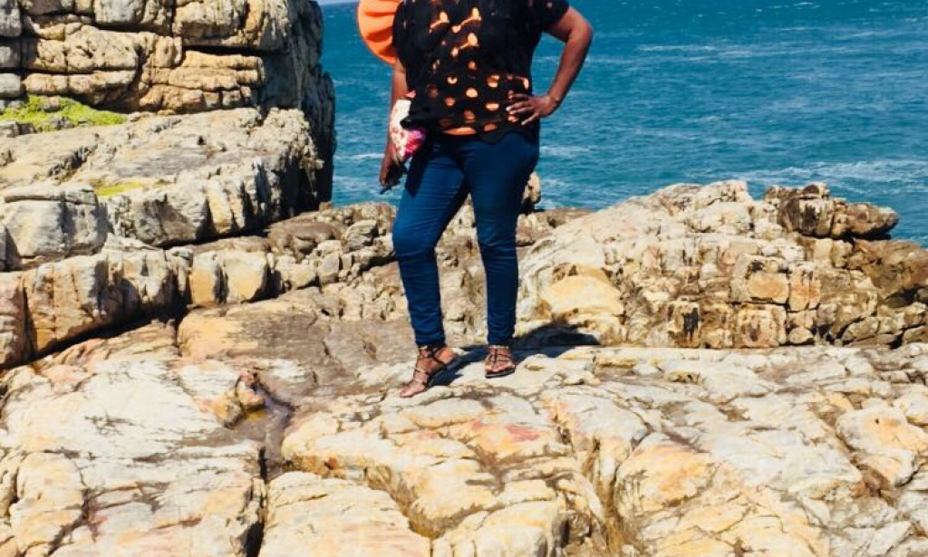 Walking by the beach .enjoying the sea breeze